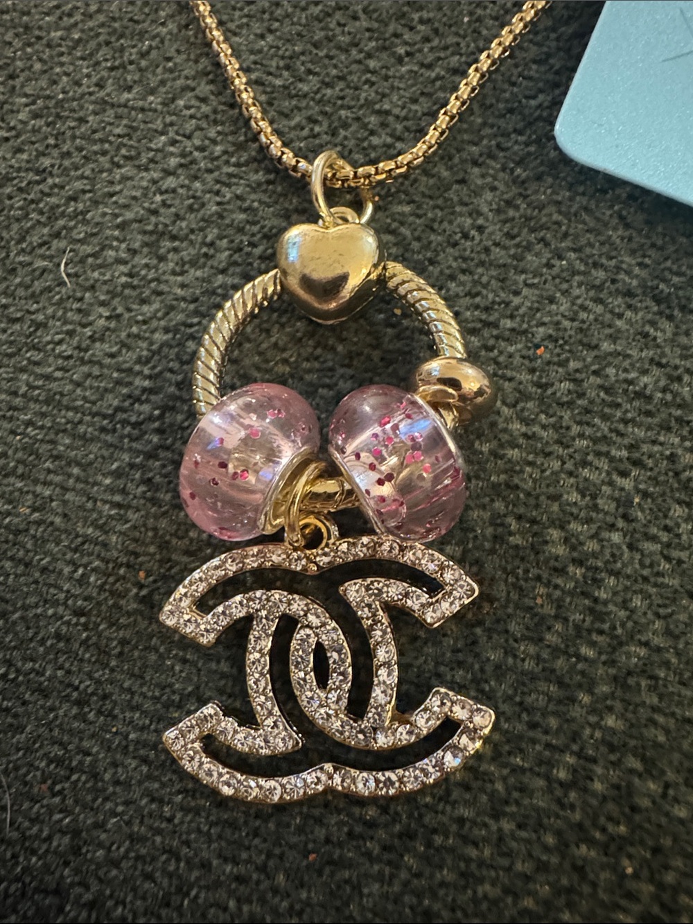 MNM Fashion Gold-Tone Logo Drop Necklace with Pink Bead Accents